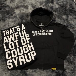 Black Zip-Up Sweater with Bold White Text